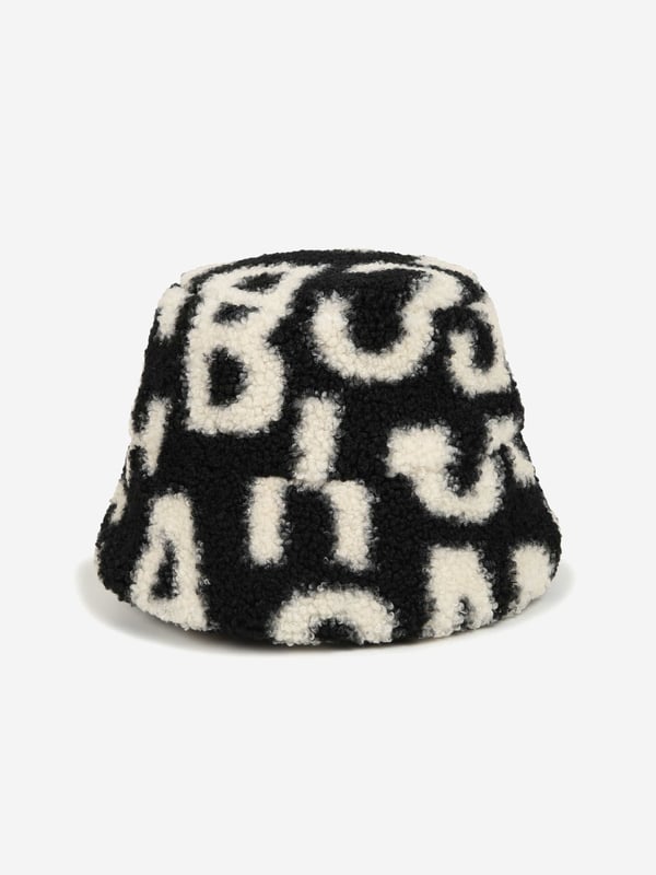 Introducing the Kids Faux Shearling Bucket Hat in Black by marc_jacobs, essential for AW2024. This chic accessory promises style and warmth for both boys and girls. Discover its standout features:‚ Luxurious Faux Shearliner: Offers a plush feel and maximum warmth.‚ Signature Black: Versatile and classic, complements any outfit.‚ Designer Craftsmanship: marc_jacobs's attention to detail ensures durability.Elevate your child's wardrobe with this stylish piece. Shop now to add a touch of elegance to their cool-weather look!