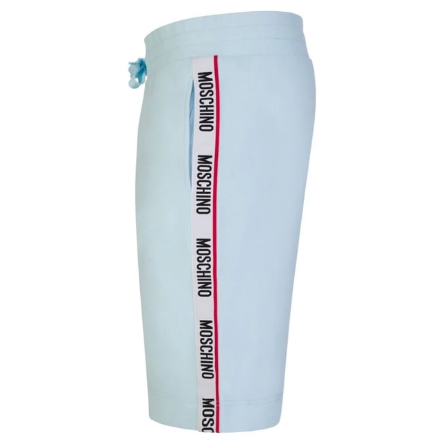 Moschino Blue Shorts, Tape Logo Down Legs, Elasticated Waist, Comfortable Stretch Fit, 95% Cotton, 5% Elastane, Back Pocket, Drawstring Ties, Moschino Loungewear, Taped Branding, Monotone Logo On Pocket