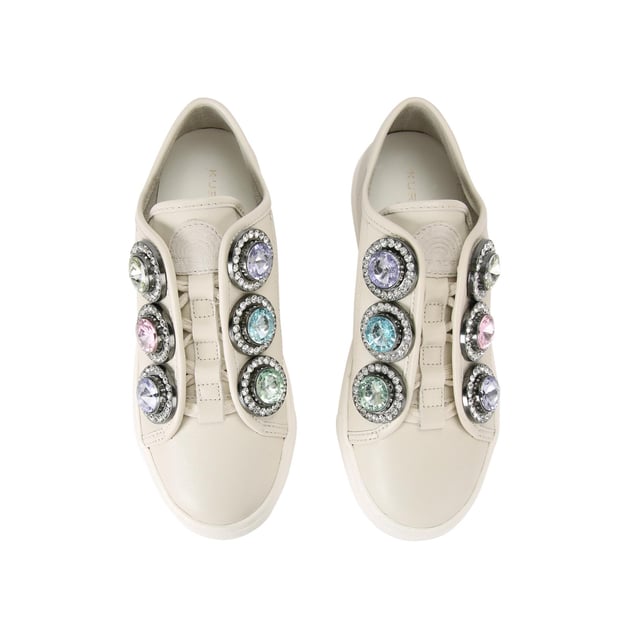 This Kurt Geiger Laney Octavia sneaker features a bone leather upper with six large pastel crystals along the eye stay. The tongue and heel features silver foil branding. Sole height: 4cm.