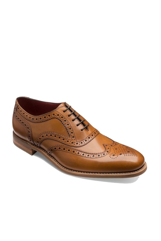 Loake Kerridge Brogue Shoe Tan
A stylish and instantly recognisable shoe, the Kerridge is an Oxford brogue that oozes English class and heritage. Featuring a fine punched brogue detail across the entire shoe and sits upon a rubber Goodyear welted sole.

100% Leather
Brogue Detailing
Goodyear welted 'Shadow' sole
Style - KERRIDGE