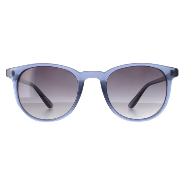 Smarty Round Unisex Transparent Blue Blue X2132  Sunglasses Elevate your style with SMARTY Designer Sunglasses model X2132B, perfect for both men and women who appreciate a blend of modern and classic design. These round-shaped sunglasses feature a striking transparent blue plastic frame paired with chic blue gradient lenses, offering superior UV protection and a bold, contemporary look. The X2132B model combines durable construction with all-day comfort, making them ideal for any occasion. Available at an unbeatable discount from the regular retail price, these designer sunglasses deliver exceptional quality and value. Upgrade your accessory collection with SMARTY and enjoy luxurious sun protection that complements your unique style.