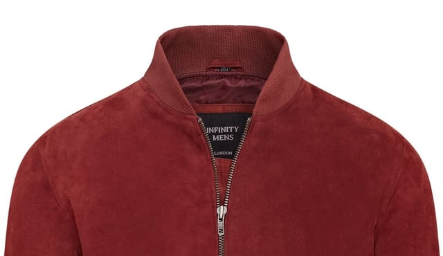 Introducing the Men's Varsity Suede Leather Bomber Jacket, a refined take on the classic MA-1 flight jacket. Crafted from 100% soft goat suede, this jacket offers exceptional durability and a supple drape. The exposed zip front features a wide, quilt stitch zip stand, complemented by a rib knit collar, cuffs, and hem for added warmth and a sleek silhouette. With four pockets�two at the waist and two inside, including a secure zipped pocket�this fully lined jacket combines style and functionality seamlessly.

� Made from 100% soft goat suede for durability and comfort
� Exposed zip front with quilt stitch zip stand
� Rib knit collar, cuffs, and hem for insulation
� Four pockets: two waist and two interior, one with a zip
� Fully lined interior for added warmth and comfort