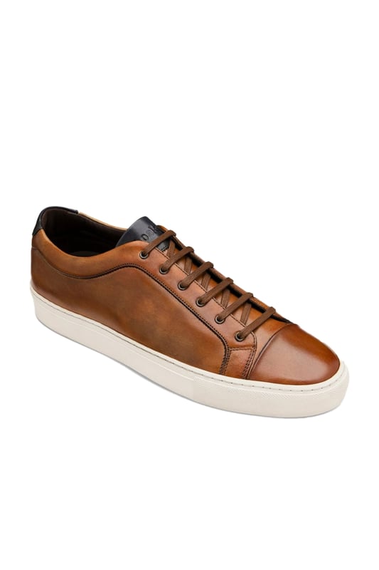 Loake Dash Hand Painted Calf Sneaker Chestnut
The Dash by Loake is a premium Calf Leather sneaker, featuring side-stitch cup rubber soles. Designed by Loake in Kettering and make to an exceptional standard, this is a great way to bring some English style and class to your casual footwear rotation.

100% Leather Upper
Premium leather
Rubber cup sole
Style - DASH