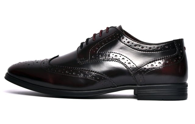 With expert craftmanship, a hi-shine leather upper, and classic brogue detailing, the Catesby England Wentworth delivers vintage styling that is sure to elevate any outfit and is a timeless essential for the fashion-forward mans wardrobe. The Wentworth is complete with a classic lace up system, durable outsole with a slight raised heel, and subtly cushioned insole for a brogue that combines style and comfort to deliver a standout design.
 - Premium hi-shine leather upper
 - 5-hole lace closure
 - Intricate stitch and punch-hole detailing
 - Durable outsole  - Authentic vintage styling
 - Catesby England branding