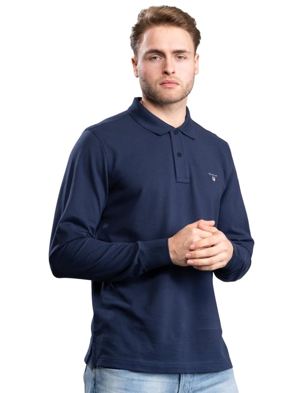 Gant Mens Designer Long Sleeve Polos feature the brands Logo, a Button-Down Collared Neckline. Crafted With 100% Cotton, these Lightweight and breathable Regular Fit Polos are Suitable for Casual or Workwear.
