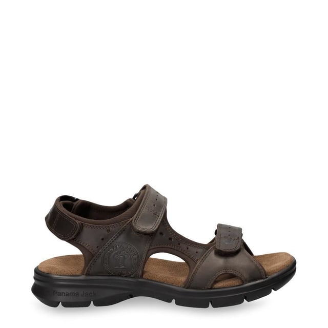 Introducing the Panama Jack Men's Leather Sandals Salton Basics, your perfect companions for outdoor adventures. Crafted with premium materials and superior craftsmanship, these sandals offer both style and functionality. Description: Experience ultimate comfort and convenience with the Velcro Closure and brown oiled Napa leather construction, ensuring a secure fit and timeless style. Enjoy a luxurious feel with Lycra lining and anatomical insole, providing cushioning and support for long walks and outdoor activities. Navigate any terrain with confidence, thanks to the flexible and durable polyurethane sole, offering stability and traction. Made in Spain, these sandals boast quality craftsmanship and attention to detail, ensuring long-lasting wear and reliability. Bullet Points: Velcro Closure for adjustable fitBrown oiled Napa leather construction for durability and styleLycra lining for added comfortAnatomical insole for enhanced supportFlexible and durable polyurethane sole for stability and traction