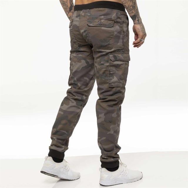 Enzo Men’s Camo Combat Cuffed Jogger Style Trousers in Grey, 65% Polyester, 35% Cotton, Elasticated Waist with Drawcord and Secured by Button, Mid Rise, Elasticated Ribbed Waist and Cuffs, 2 Front Pockets, 2 Buttoned Back Pockets and 2 Velcro Side Pockets, Zip Fly Fastening, Machine washable, Suitable For All Year Round Wear And Casual Occasions.
