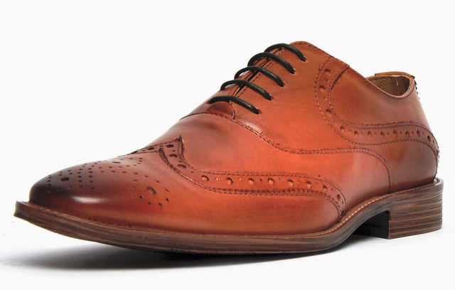 A wardrobe staple, these Catesby England Remington mens brogues are sure to elevate your smart-casual attire. The premium leather upper features classic punch hole detailing and intricate designer stitching, all in an on-trend colourway designed to impress. A slimline outsole completes the look and ensures sophisticated looks and increased traction. 
 - Leather upper
 - Classic brogue detailing throughout
 - Lace up fastening for a secure fit
 - Sturdy rubber outsole
 - Catesby England branding