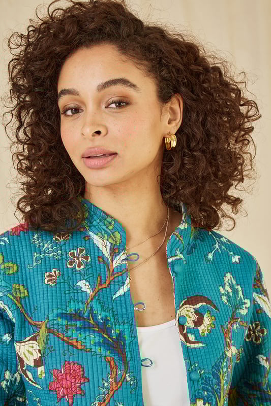 For bang on trend outerwear for the summer we love this Teal floral quilted jacket from Yumi. Made using a traditional quilting technique, from lightweight cotton, this reversible garment really is a show stopper. With a different unique print on the inside, the tags and care labels are sewn into the pockets so you can change your look easily. Pair with jeans and a T-shirt for an off duty look, or 2!