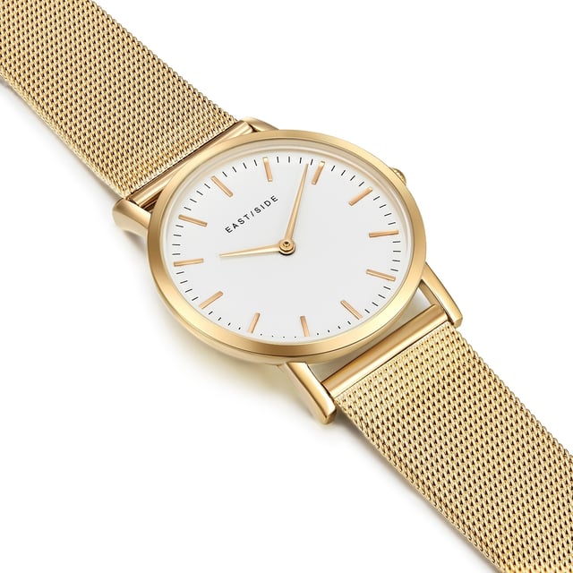With a lot of feeling for design, this women's watch in the label Eastside combines modern and classic elements - noble and timelessly like the New York district of Eastside. The housing with screwed stainless steel housing floor receives a noble and warm shine due to a scratch-resistant ion plate made of yellow gold, which contrasts with the white dial. Simple dashes and delicate swords adapted perfectly to the minimalist-elegant look. A highlight is the filigree and also coated stainless steel bracelet coated with yellow gold, which nestles comfortably on the wrist and never gets out of fashion with its delicate mesh look.