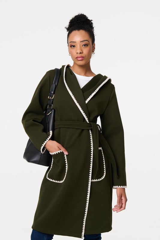 Throw on an extra layer in style with this tie up coat. It's finished with a decorative blanket stitch and front pockets, as well as an adjustable waist tie. The longline thigh length hem will look great layered over trousers, jeans or a skirt, so you can wear it with practically any outfit.