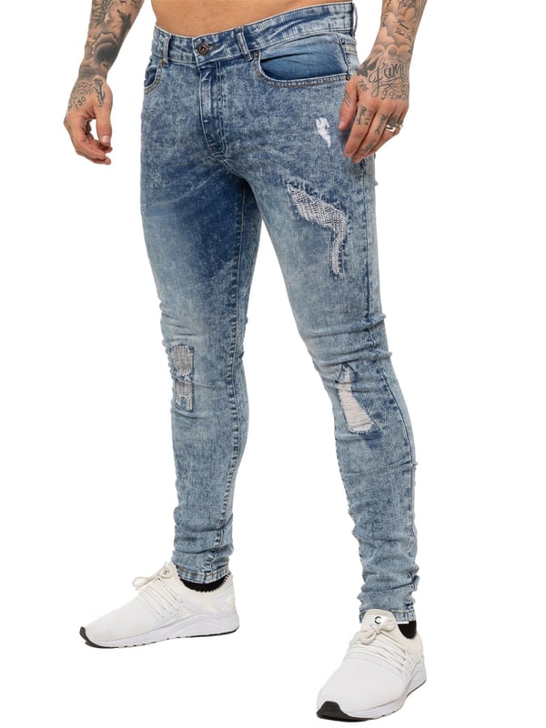 Enzo Mens Skinny Stretch rasgó los jeans angustiados. Efecto de rasgadura y reparación, cierre de mosca Zip. Dos bolsillos delanteros, dos bolsillos traseros, bolsillo de una sola moneda. Remaches y botones de marca.
