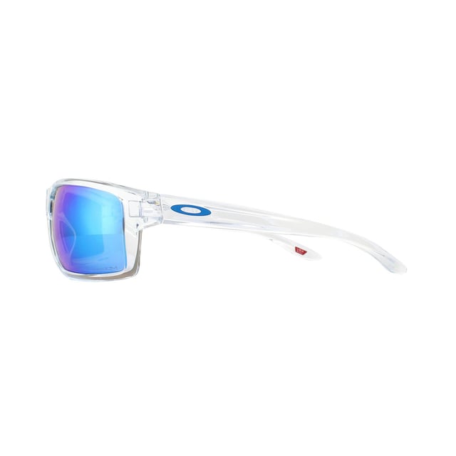 Oakley Sunglasses Gibston OO9449-04 Polished Clear Prizm Sapphire are a highly wrapped design for protection from all angles, and is equipped with classic Oakley features for a high quality finish. Three-point fit, lightweight O Matter frame and designed to be hat compatible and extended peripheral view temple design.