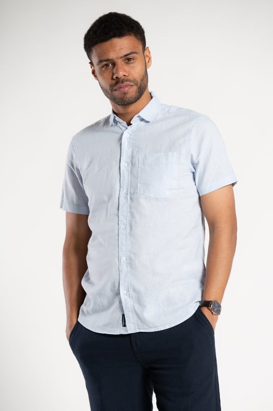 Blue Linen Blend Short Sleeve Button-Up Shirt With Chest Pocket Upgrade your summer wardrobe with this short-sleeved, linen shirt from Tokyo Laundry. Made from a breathable blend of linen and cotton, this shirt offers comfort and style with its classic fit. The shirt features button fastening and a chest pocket. Machine washable for easy care.