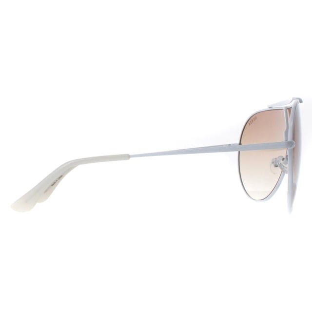 Guess Shield Womens White Brown Gradient GF0370  Sunglasses are a fashionable shield frame shape, exuding a sense of timeless elegance. The frame is crafted from high-quality metal, known for its durability and lightweight feel, ensuring long-lasting comfort throughout the day.