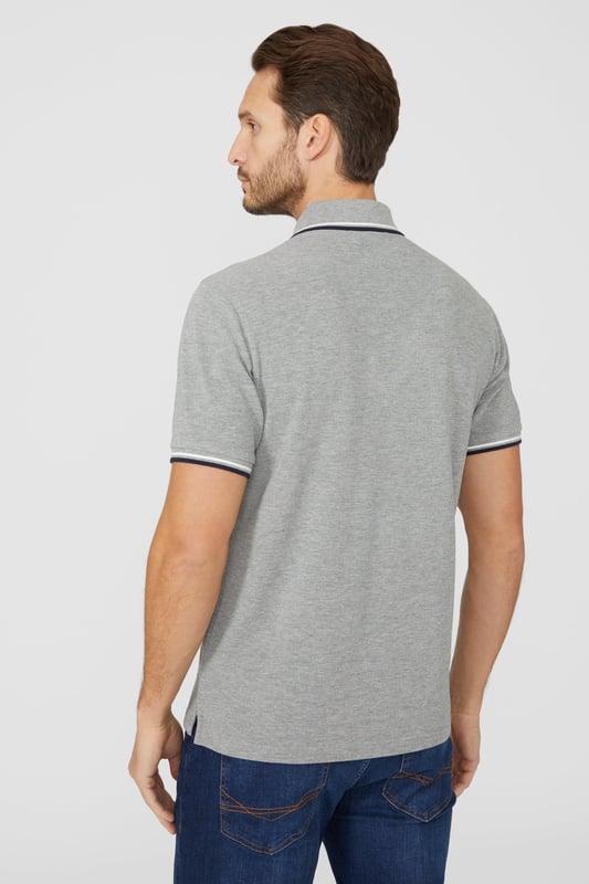 Introducing our Pique Tipped Polo, the perfect addition to any man's smart casual wardrobe. Crafted with meticulous attention to detail, this polo offers a sophisticated and polished look. The pique fabric provides a comfortable and breathable feel, making it ideal for all-day wear. With its stylish tipped collar and cuffs, this polo adds a touch of elegance to any outfit. Whether you're heading to the office or out for a casual gathering, our Pique Tipped Polo is the ultimate choice for a smart and effortlessly stylish look.