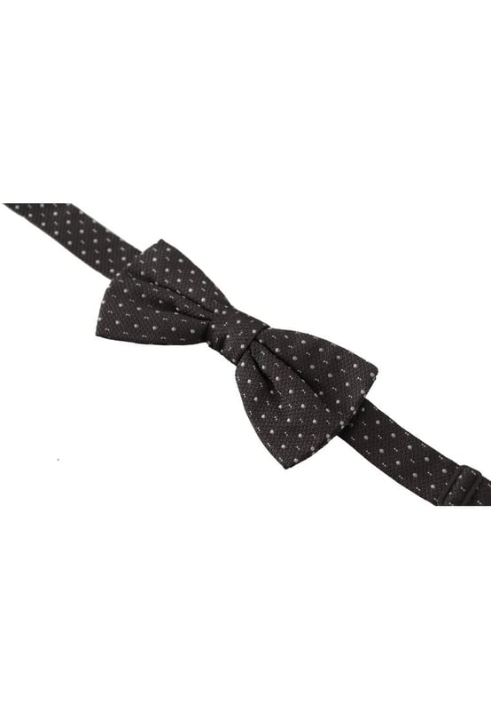 100% Authentic Dolce & Gabbana Silk Bow Tie
  Color: Black and Gray Polka Dot
  Model: Tied
  Material: 100% Silk
  Adjustable length neck strap one size
  Made In Italy
  Width: 6cm
Material: 100% Silk