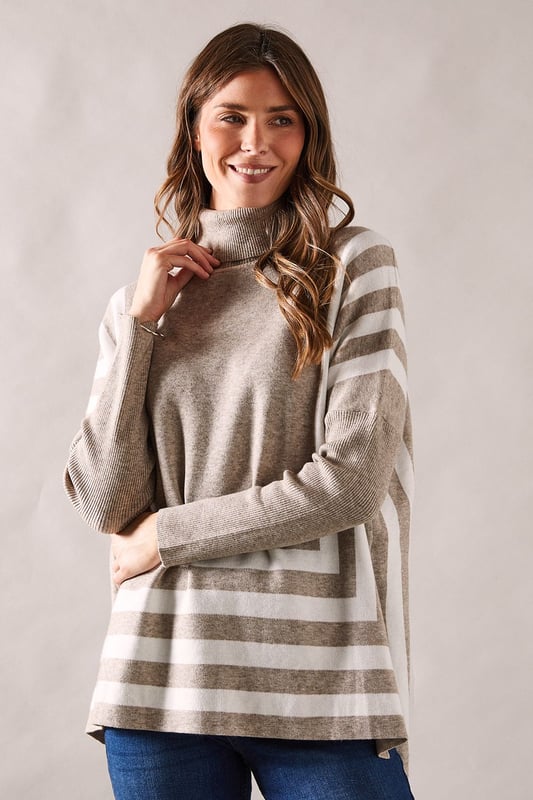 Chic striped roll neck poncho design
        Oversized, relaxed fit for ultimate comfort
        Elegant contrasting stripe pattern
        Long sleeves with dropped shoulders
        Versatile length suitable for various styling options
    
    Embrace sophistication and comfort with this striking striped roll neck poncho from Wallis. The oversized silhouette offers a relaxed fit, perfect for those who appreciate both style and ease. The elegant contrasting stripe pattern adds visual interest, while the long sleeves with dropped shoulders contribute to its laid-back charm. Ideal for casual events and family gatherings, this versatile piece can be styled effortlessly. Pair it with slim-fit trousers and ballet flats for a polished daytime look, or layer it over a fitted dress with ankle boots for a more refined ensemble. The poncho's adaptable length allows for various styling possibilities, making it a wardrobe staple for the fashion-forward woman who values both glamour and practicality in her everyday attire.