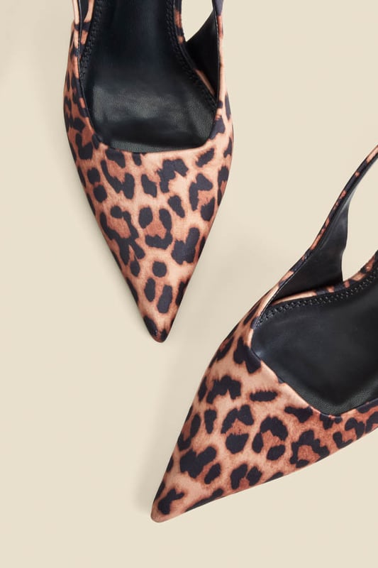 We're obsessed with them too Crafted from luxe crinkle leather in a stunning cherry red patent finishChic slingback with an elasticated insert for a comfortable fit Sexy pointed toe silhouetteSet on a super-wearable flared kitten heel We love them with jeans and a blazer