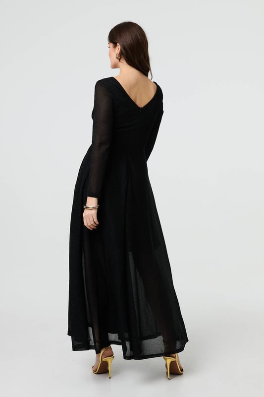 Whether it's a black tie event, a wedding or a formal party; you'll look beautiful in this maxi dress. It has a flattering v-neck and empire waist, with long sleeves and an a-line skirt. The semi sheer metallic fabric and side splits give it a Hollywood glamour finish, ready for the red carpet.