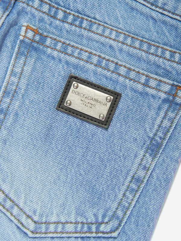 Dolce  Gabbana incorporate passion and enigmatic detailing into their exquisite designs. These unisex skinny jeans capture the Italian label's passion for innovation combined with a daring pathology embodied in aesthetics. Crafted in beautiful cotton denim with an intricate detailed 'Milano Dept DG' side logo via a traditional five-pocket design and silver embellished branded tag on the back.  Regular Fit 100% Cotton