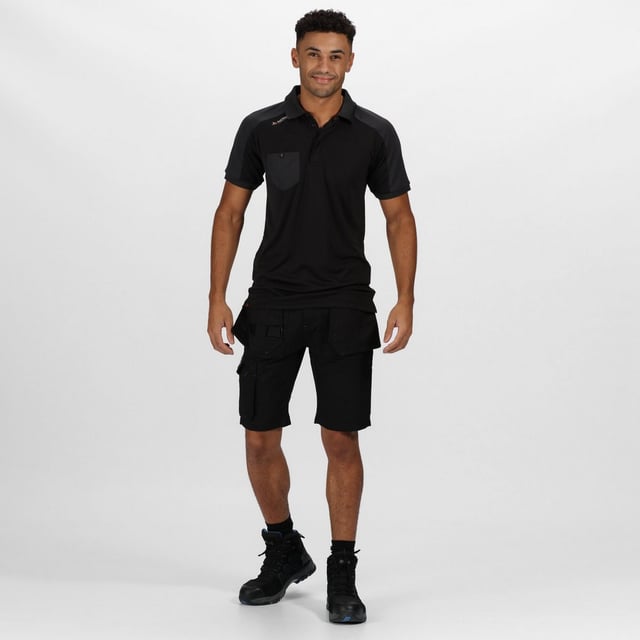 65% Polyester, 35% Fabric. 245gsm. Design: Logo, Plain. Pockets: Holster Pocket, 2 Front Pockets, Cargo, Buttoned, 2 Back Pockets, Tool, 1 Mobile Phone Pocket. Fastening: Button, Front Zip. Fabric Technology: Durable, DWR Finish. Reinforced Seams, Triple stitched seam, Water Repellent.