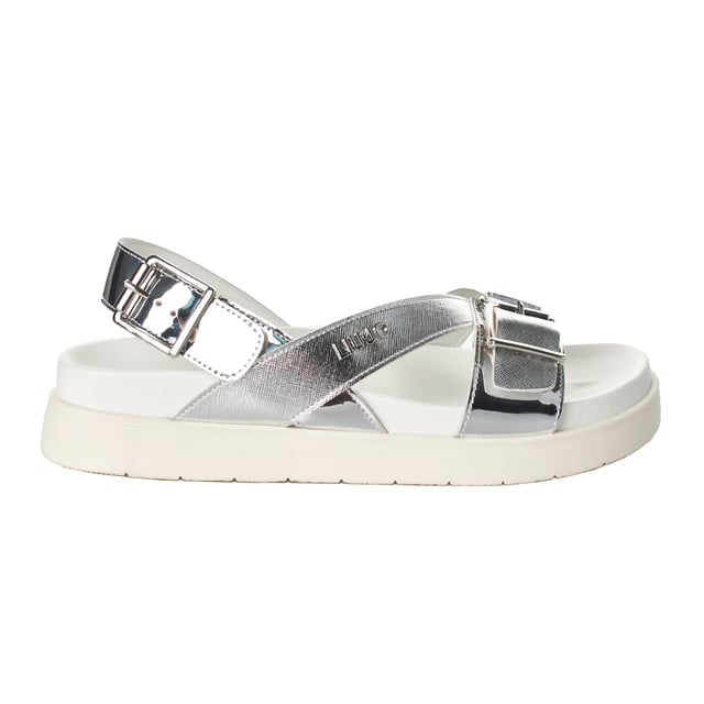 Sandalias con plataforma de Liu Jo con un diseño elegante que combina detalles brillantes y funcionalidad para un estilo moderno.

Características:

- Sandalias de plataforma elevada que proporciona comodidad y altura, ideal para un look contemporáneo.
- Tiras cruzadas con acabado metálico que añaden un toque sofisticado y distintivo.
- Cierre ajustable en el tobillo con hebilla metálica para un ajuste seguro y personalizado.
- Detalle del logotipo Liu Jo grabado en una de las tiras, reflejando autenticidad y exclusividad.
- Plantilla acolchada para garantizar confort durante todo el día.
- Alto de la plataforma: 4 cm. 
- Incluyen bolsas de almacenamiento para mayor cuidado y protección.

Estas sandalias de plataforma Liu Jo destacan por su diseño moderno y cómodo, perfectas para realzar cualquier outfit con elegancia y practicidad.
 Composición: Exterior: Poliuretano; Interior: Piel; Plantilla: Poliuretano; Suela: TPR
 Cuidados:
- Limpiar con un paño húmedo.
- Evitar mojarlas en exceso.
- Guardar en un lugar fresco y seco.