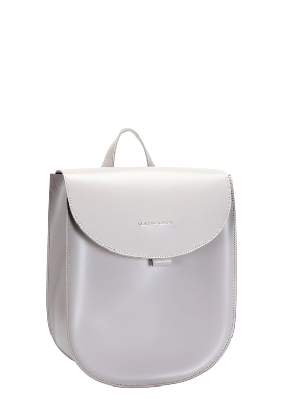You’ll be ready to take on anything the day holds with our minimalistic backpack uplifting any outfit. This wardrobe staple can be styled up or down from a floral dress to mom jeans, the unique, contemporary shape featuring gun metal buckle detailing and our debossed logo creates a chic and unforgettable look. Features: , Claudia Canova blind debossed logo, Flapover front with mag-dot fastening, Grab handle, Two adjustable backpack straps, Gunmetal hardware Style Ref: 84312 GREY