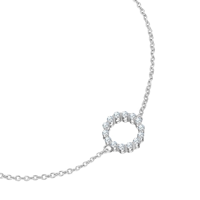 Do you love timeless jewelry with a modern circle? Then the elegant bracelet from the Glanzstücken München brand is just right for you. The circular pendant, set with sparkling zirconia, brilliantly highlights your wrist. Made of high-quality 925 sterling silver and rhodium-plated, it remains tarnish-proof and maintains its elegant look. The practical spring ring clasp ensures secure wearing comfort and can be opened and closed effortlessly. Whether as an elegant evening accessory or a sparkling daytime highlight - this bracelet is versatile and stylish. Treat yourself to a piece of luxury or give it as a gift to someone special!