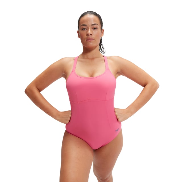 Dames Speedo Shaping Crossback Swimsuit in roze.- Ronde hals met gekruiste rugbandjes.- Verstelbare gekruiste rugbandjes.- Body shaping over het hele lichaam.- Shape Comprex is een hoogwaardige stof die shapewear innovatie combineert met zwemkledingtechnologie.- Ultra chloorbestendig - LYCRA® XTRA LIFE™ gaat twee keer zo lang mee als standaard zwemkledingstoffen.- Shape Comprex is gedeeltelijk gemaakt van gerecycled afval. Het Nylon garen in de stof is gemaakt van 100% pre-consumer afval zoals afvalstof van fabrieken.- Ref: 800369815352Let op: retourzendingen worden alleen geaccepteerd als het hygiënelabel nog aan het product bevestigd is.