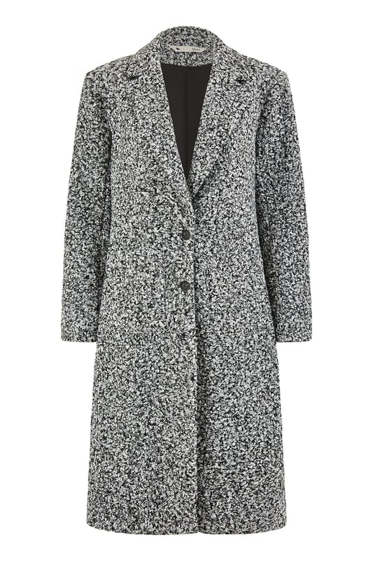 Amazing outerwear will see you through the season in style. This long line over coat is perfect for everyday wear. In a gorgeous boucle fabric that is both style and cosy, the simple and elegant design is a classic. With a collared neckline and deep front pockets.