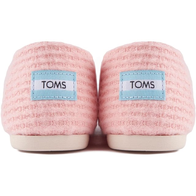 This Comfy Go-to Alpargata Slip-on Comes In A Soft And Chunky Rib Knit Design For A Cosy Texture. Stay Comfortable Thanks To The Padded Ortholite Footbed And The Durable, Cushy Outsole. These Iconic Plimsolls Are Further Complemented With A Branded Heel Cap And Toms Signature Branding Tab On The Side.