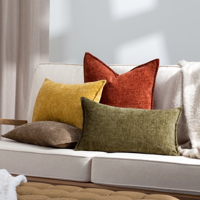Relax in everyday luxury with the beautifully designed Buxton cushion. Complete with a soft, luxe-feel woven fabric, this reversible design is finished with an Oxford edge trim, and available in a range of soft jewel tones.