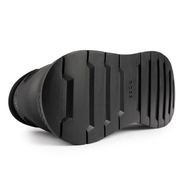 A Classic Running Shoe With An Urban Edge, The Boss Titanium Runn Trainer Is Crafted From Quality Materials And Made To Stand Out, Featuring Sleek, Black Mono Details, An Embossed Logo And Cushioned Footbed. These All-in-black Designer Trainers Will Be Sure To Keep You Ahead Of The Race.