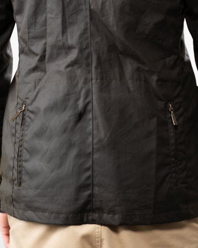 Barbour Beacon Sports Wax Jacket
As this is a slim fitting jacket, we would advise purchasing the next size up than you would normally choose. The three-pocket waxed Beacon Sports jacket is an iconic blazer-style button through, inspired by the sought-after, limited edition To Ki To Sports Jacket. Effortlessly stylish and easy to wear, the Beacon Sports Jacket is a mediumweight waxed cotton jacket featuring soft leather-bound cuff edges, shoulder and elbow patches, two zipped rear pockets and a button-up throat flap. Lined with Barbour tartan, this jacket reflects traditional Barbour elements, with classic hip-height bellows pockets and a single chest pocket. This jacket is surprisingly versatile, and looks great worn as a blazer with the collar folded down and lapels open, or with the collar turned up worn over a fine-knit jumper and scarf for a contemporary country look.

Tailored Fit
Barbour tonal embroidery to left pocket
Outer: 100% cotton (waxed)
Lining: 100% cotton
Trim: 100% wool
6oz waxed cotton
Do not wash
Sponge clean only
Back length: 69cm - 81.5cm

MWX0007