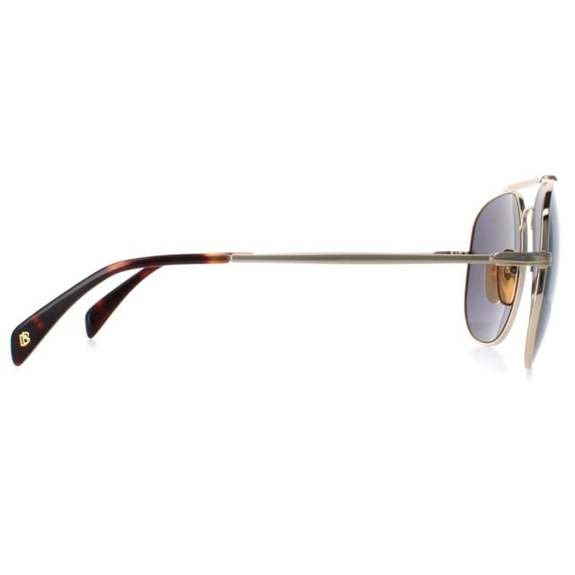 David Beckham Aviator Mens Gold Silver DB7004/S  Sunglasses are a stylish and modern accessory that offers both fashion and function. With a sleek and minimalist aviator design, these sunglasses are the perfect addition to any outfit, whether you're dressing up for a special occasion or keeping it casual on a sunny day. The adjustable nose pads and temple tips ensure a comfortable and secure fit, making these sunglasses suitable for all face shapes. Whether you're going for a run, hitting the beach, or just spending time outside, these sunglasses will keep you looking sharp and feeling confident.