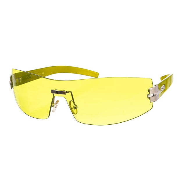 Gafas sol de mujer, de acetato sin montura 
Color verde.
Forma rectangular.
Lentes de color verde.
Aplicación metálica rectangular color plata en el puente.
Patillas de acetato en tono verde, con aplicación metálica incrustado con la marca grabado.
100% Protección UV. 
Cristales antirreflejo.
Incluye: Todos nuestros productos se envían en el interior de su estuche original, con los certificados de autenticidad y garantía. 
 
Más Información:
Medidas:
Alto lente: 41 mm.
Ancho lente: 162 mm.
Puente: 00 mm.
Patillas: 120 mm.