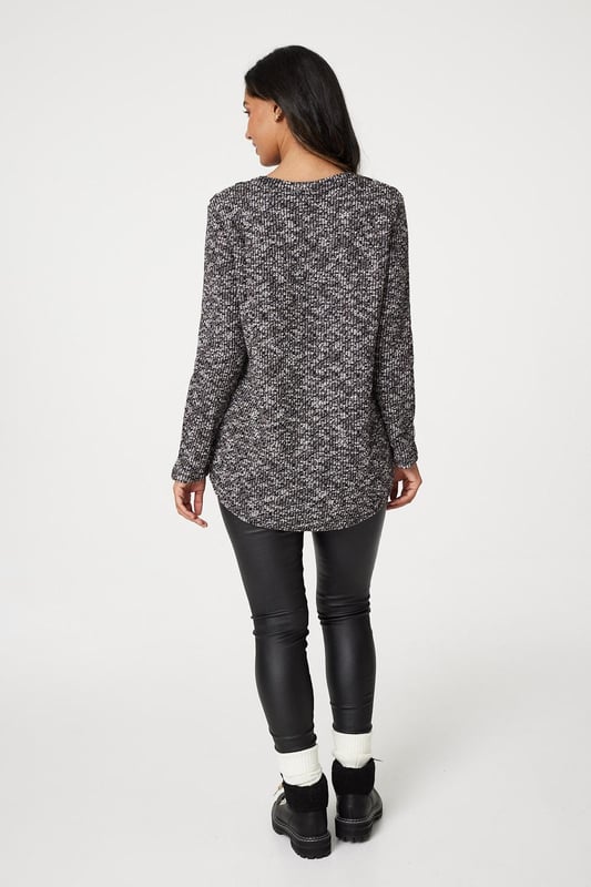 Elevate your casual wardrobe with this marled longline pullover. It has a round neck, long sleeves, a button embellishment at the shoulders, relaxed fit and a thigh length hem. Pair with jeans and trainers for an on-trend weekend look.