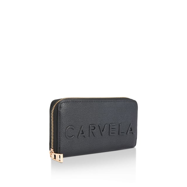 The Frame Purse features a textured black exterior with embossed Carvela logo. The zip closure opens to an interior with multiple card slots and zipped compartment. Dimensions: 10cm (H), 19cm (W), 2cm (D).