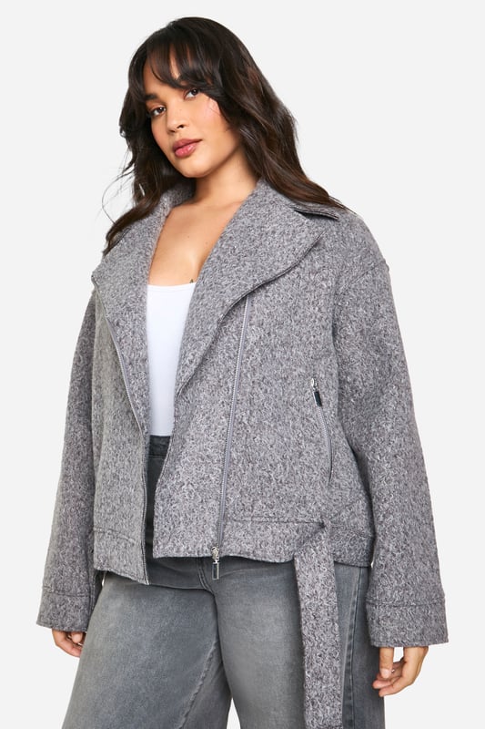 Plus Boucle Belted Biker Jacket boohoo PlusYou’ll find full on fashion for the fuller figure with the boohoo Plus range. Delivering directional designs for UK sizes 16 to 24, this ultra-flattering collection combines perfectly proportioned fits with statement styles so that you can stay on top of this season’s trends.