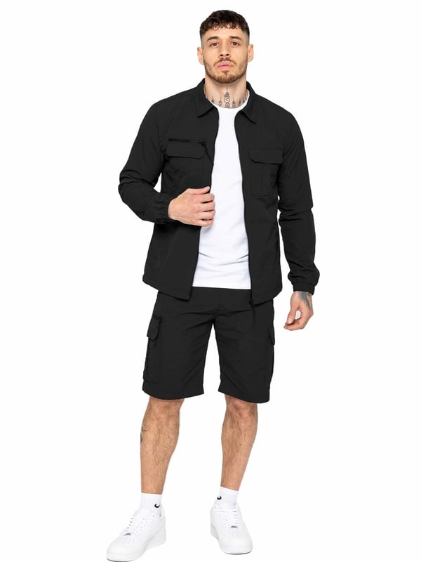 Engineered for comfort and versatility, these poly cargo shorts will elevate your casual wardrobe. Made from a durable woven crinkle fabric, they boast a relaxed elasticated waist and drawstring fastening for a perfect fit. Stay organized with zip-fastened side and leg pockets, adding a touch of utility to your summer ensemble. Pair with a classic t-shirt and trainers for effortless style.