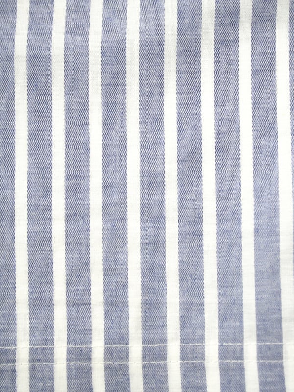 Blue and White Stripe Traditional Shortie Pyjamas.

Our classic short sleeve crisp summer cotton boys pyjamas in a blue and white stripe creates a traditional look that’s perfect for lounging or sleeping. Made from super-soft 100% crisp cotton. The set is trimmed with white cotton piping. The top has an open collar and revere, single square pocket with MV tab and fastens with Mini Vanilla Engraved buttons. The crisp cotton comfy shorts have a fully soft elasticated waist for extra comfort. 

Sold as a Pyjama set.
Fabric 100% cotton - crisp summer weight.
Fire Warning : KEEP AWAY FROM FIRE AND FLAMES.
Wash Care Instructions : Machine wash inside out, do not soak, wash dark                    colours separately, do not iron trims. Save energy and wash at 30 degrees.
Do not tumble dry