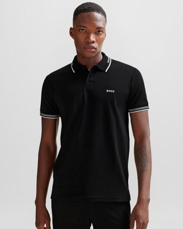 A contemporary polo shirt cut to a defined fit by BOSS Menswear, created in stretch cotton with contrast stripes and branding.

Slim fit
Flat-knit collar
Number of buttons: 2
Short sleeves
Flat-knit cuffs
Standard length
92% Cotton, 8% Elastane

50506193