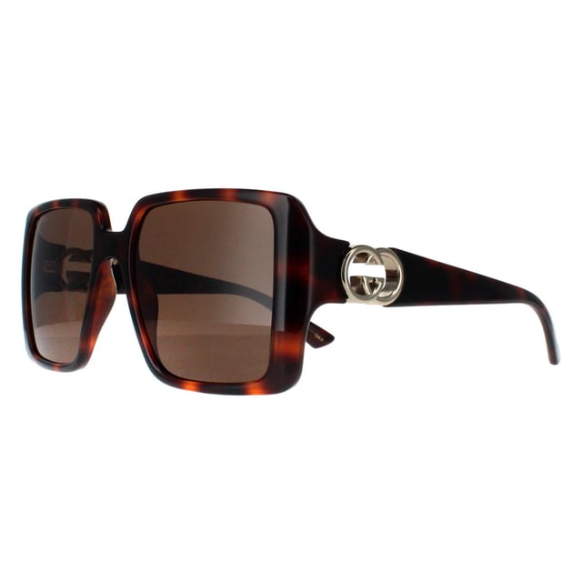 Gucci Square Womens Dark Havana with Gold Dark Brown GG1692S  Sunglasses feature a striking, oversized frame with a unique, softly contoured shape that enhances any look with a touch of glamour. Embellished with the iconic double-G logo on the temples, the GG1692S model proudly showcases the essence of Gucciâ€™s timeless style. The high quality lenses ensure exceptional UV protection, making them as practical as they are stylish. Available in a variety of refined colors, these sunglasses are the perfect choice for those who seek to combine bold elegance with modern fashion sensibilities.