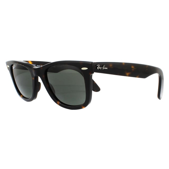 Las gafas de sol Ray-Ban Wayfarer 2140 Tortoise Green G-15 polarizadas medianas de 50 mm son uno de los estilos de gafas de sol más conocidos y vendidos en todo el mundo, y son muy populares entre famosos, músicos y artistas. Su distintivo diseño angular y su montura gruesa son toda una declaración de estilo, y Ray-Ban utiliza constantemente colores y diseños vibrantes para actualizar este estilo clásico y popular. La ligera montura de acetato es cómoda y el logotipo de Ray-Ban aparece junto a las patillas aladas esculpidas en la esquina de la lente.