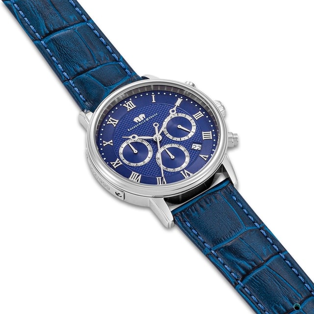 With totalists for hour / minute / second as well as stopwatch and date display, this sporting watch model of the Rhodenwald & Sons manufacture is convincing with popular chronograph functions. The timeless design concept manifests itself in the balancing of the symmetrical tricompax arrangement, classic Roman digits and luminiscant Breguet devices. A stainless steel housing with screwed floor makes the watch a durable everyday companion. The exclusive look is completed by a real leather bracelet with crocodile and decorative seam. The interior also inspires watch lovers with a high -quality quartz train that guarantees the highest precision and durability.