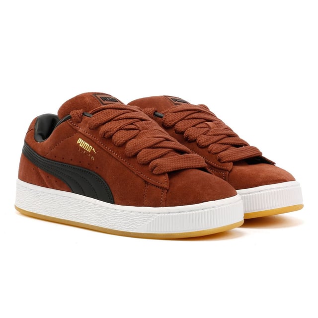 Sneakers featuring a premium suede upper for a sleek and stylish look. Debossed and foil-printed PUMA branding on the quarter panel adds a touch of sophistication. Finished with a durable rubber sole for reliable traction and comfort.