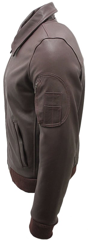 Invest in this timeless leather jacket, crafted from real cow hide leather. This bomber jacket features a classic shirt collar and is short in length and features 3 external zipped pockets for added practicality. To help provide a more customized fit the jacket features a ribbed hem and cuffs. Lend a sleek touch to your wardrobe with this simple yet smart and durable leather jacket