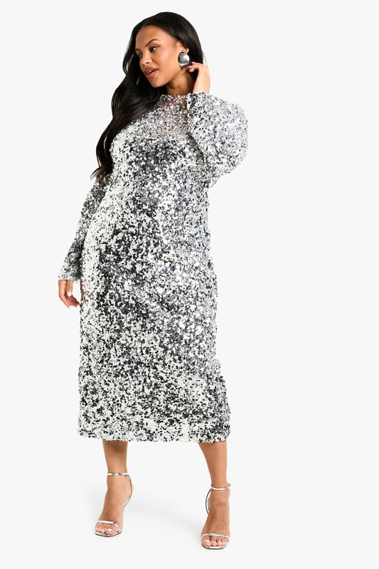 This plus size shift dress is the ultimate style of the season. A short dress that hangs straight down from the shoulders with clean and simple lines, we love this style for its ultimate comfort and super flattering fit. Seeing you through from daytime plans to evening drinks, just pair with statement heels and a matching clutch...sorted. An ideal alternative to a bodycon, this floaty dress will look good on you girl. Need more inspo? A plus size shift dress with sleeves is the perfect transitional piece and looks just as good worn with trainers as it does lace-up heels. Style: Shift DressFabric: SequinLength: MiniSleeve Length: Long Sleeve