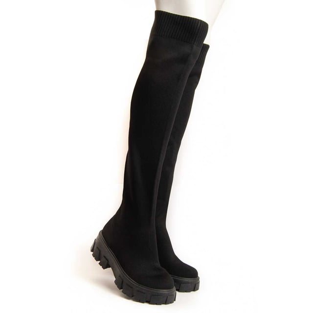 Plateaustiefel für Damen. Bequeme Passform. Hergestellt aus veganen Materialien. Hergestellt von anderen Marken für unsere Marke. Ungefähre Maße: 5 cm Absatz, 3 cm Plateau, 55 cm Schafthöhe und 12 cm Schaftbreite.